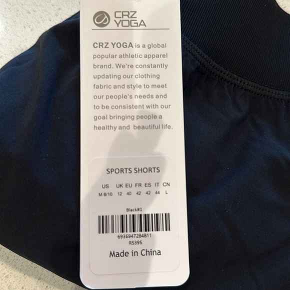 Feathery-Fit Soft Mid Rise Dolphin Lined Shorts 4'' - Picture 3 of 4